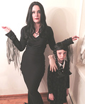Morticia and Wednesday Addams with Thing Costume