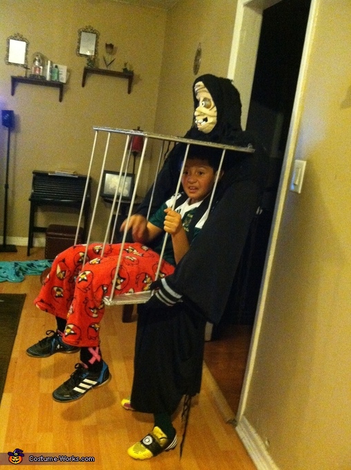 Boy in a Cage Costume