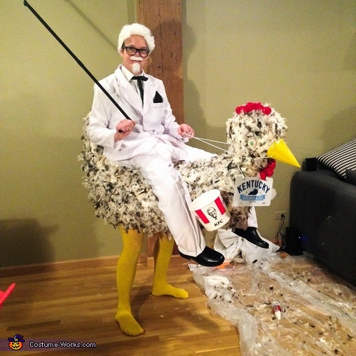 KFC Colonel Sanders riding a Chiken Costume
