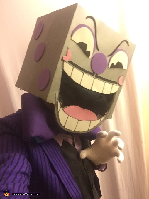 A cosplayer dressed as King Dice from the video games Cuphead