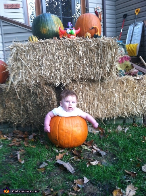 Baby in a Pumpkin Costume