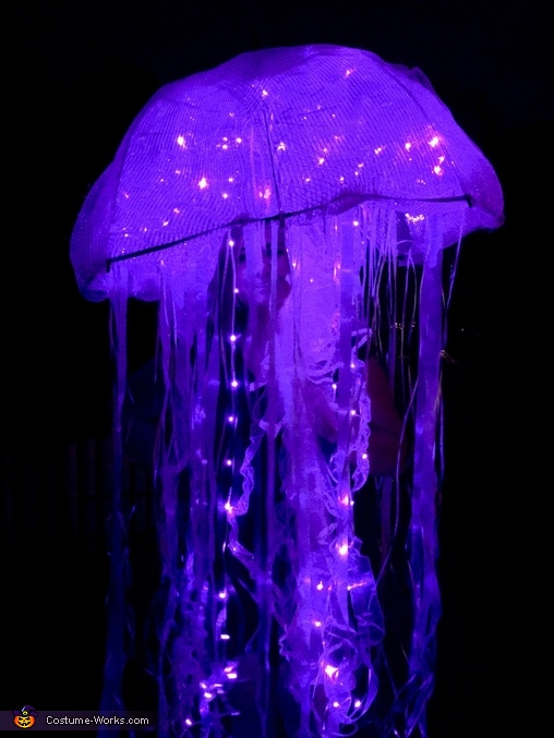 Get ready to shine this Halloween with a stunning bioluminescent jellyfish  costume!