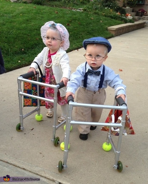 twin babies in halloween costumes
