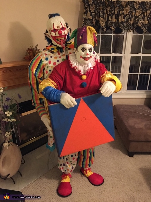 Scary Clown Carrying a Jack in The Box Illusion Costume