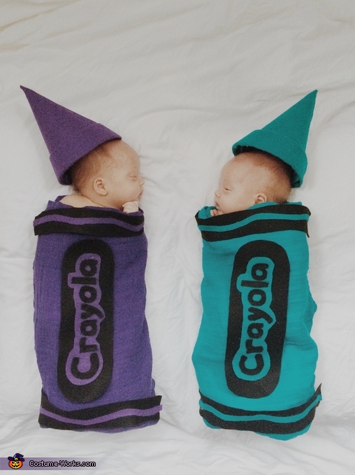 twin babies in halloween costumes