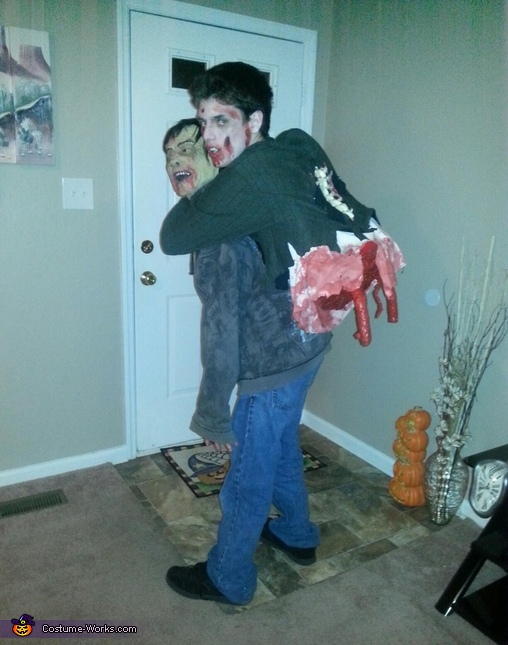 Zombie carrying split  in half Zombie Illusion Halloween  