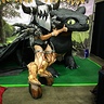Photo #1 - This was at fandom fest in front of Brazenmonkey's Toothless sculpture