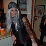 Photo #10 - A wig, corset, and some fake tattoos completed the look