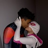 Photo #2 - Miles and Gwen kiss