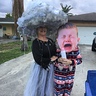 Photo #1 - Mama and me in the driveway handing out candy.