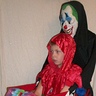 Photo #2 - Scary Clown Carrying Jester