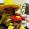 Photo #1 - The Man in The Yellow Hat