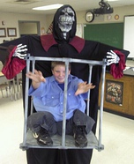 Illusion costume ideas - Boy Trapped in Cage by Monster